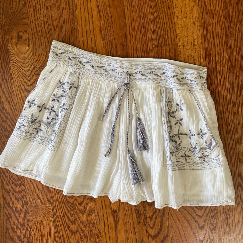 William B - Boho embroidered shorts with tassels.